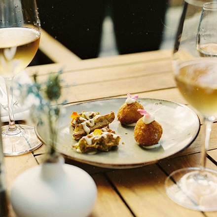 Small plates and wine served outdoors in Franschhoek
